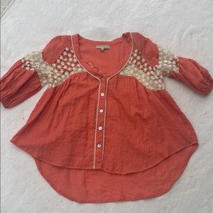 Coral top with shear flower detailing